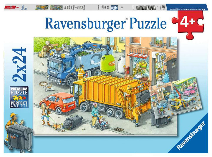 Müllabfuhr und Abschleppwagen