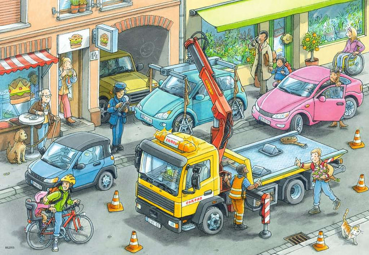 Müllabfuhr und Abschleppwagen