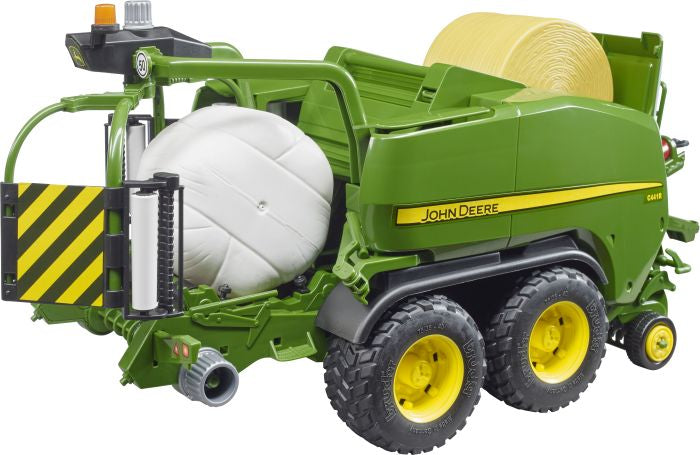 John Deere Rundballen-Presswickelkombi.